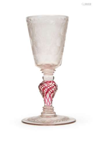 AN ENGRAVED CRANBERRY SWIRL GLASS, PROBABLY ENGLISH 18TH/19T...