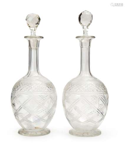 A PAIR OF CUT CRYSTAL DECANTERS, 19TH CENTURY