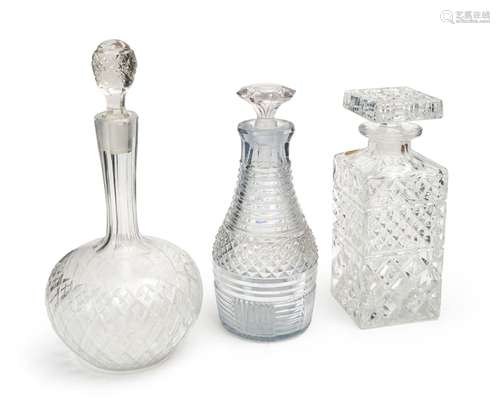 THREE CUT CRYSTAL GLASS DECANTERS