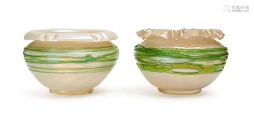 A NEAR PAIR OF GLASS BOWLS