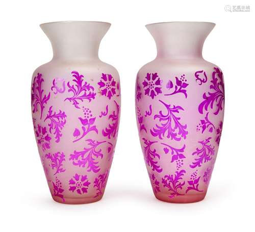 A PAIR OF GLASS VASES