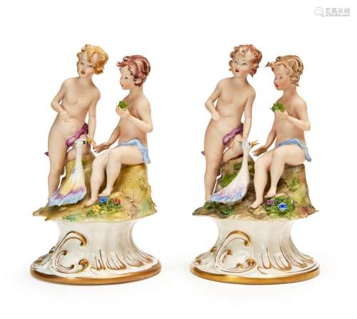 A PAIR OF NUDE LOVER FIGURINES