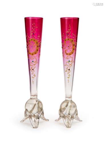 A PAIR OF CRANBERRY GLASS FLUTED VASES