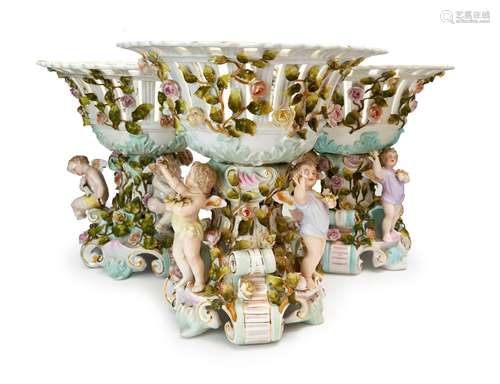 THREE ENCRUSTED CHERUB FLORAL CENTREPIECES, GERMAN