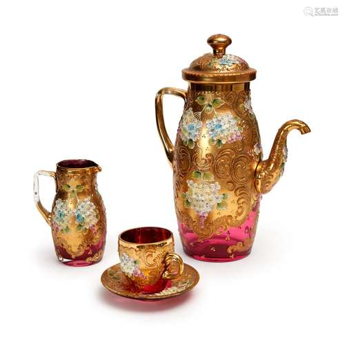 A THREE PIECE GILT CRANBERRY GLASS PART TEA SERVICE