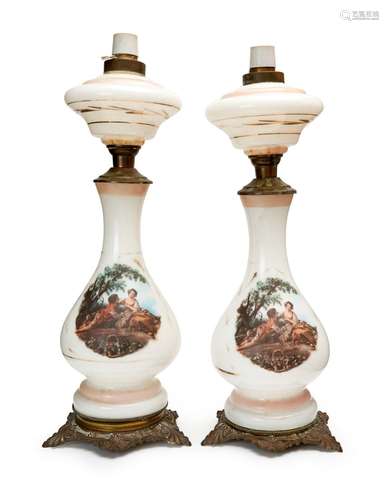 A PAIR OF HAND PAINTED FLORAL OPALINE OIL LAMPS, 19TH CENTUR...