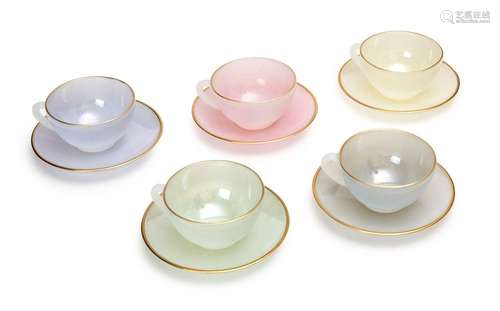 A SET OF FIVE HARLEQUIN GLASS TEA CUPS & SAUCERS