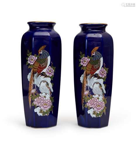 A PAIR OF PORCELAIN PEACOCK VASES