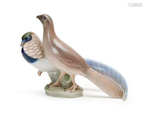 A BIRD FIGURINE SET, ROYAL COPENHAGEN