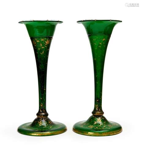 A PAIR OF GREEN GILT DECORATED FLUTED BOHEMIAN VASES, 19TH C...