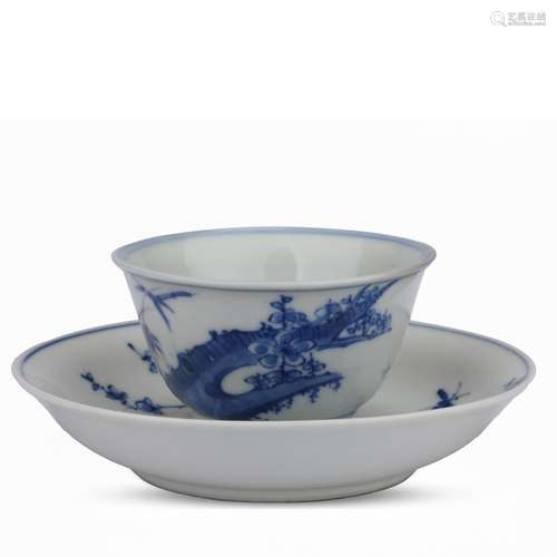 Blue and white porcelain cup and saucer with plum blossom pa...