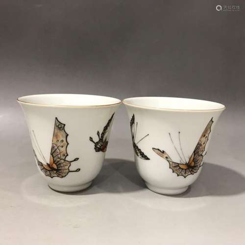 Pair of ink and gold bell cups