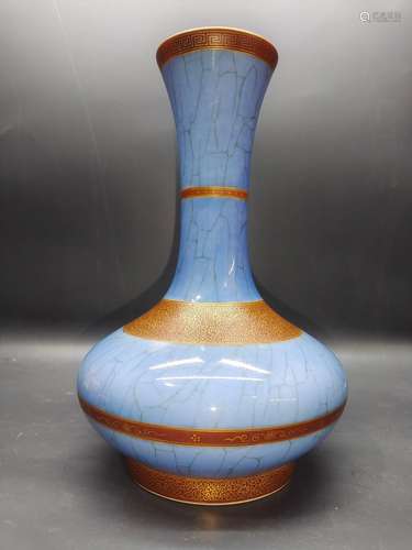 Blue glaze tracing gold reward bottle