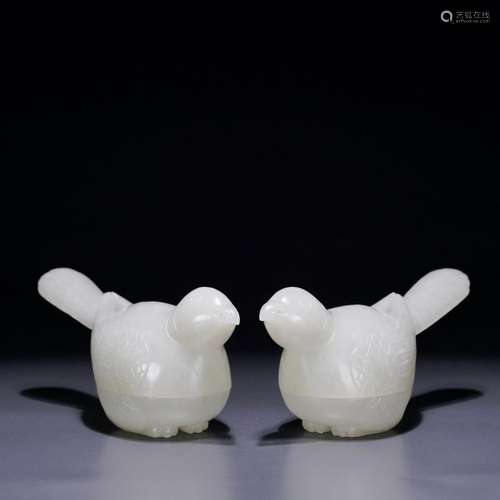 A pair of Hetian jade lid boxes for living and working in pe...