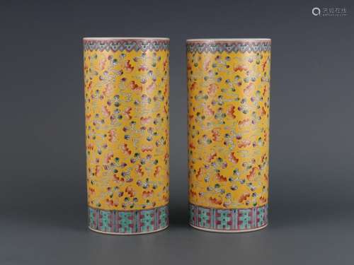 A pair of yellow-ground famille rose Hongfu Qitian caps