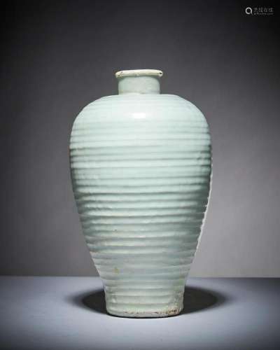 A Chinese pale celadon ribbed vase