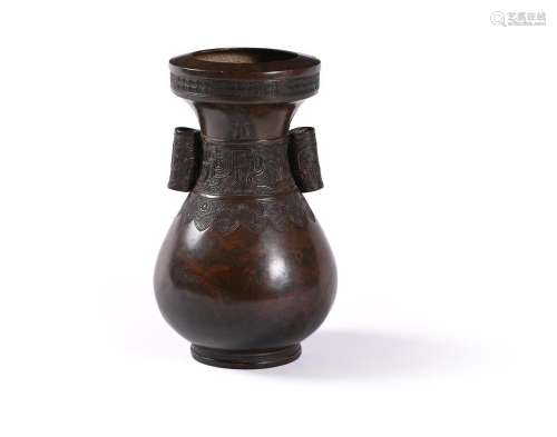 A Chinese bronze twin handled vase