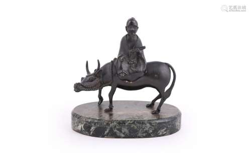 A Chinese bronze \'Laozi and buffalo\' incense burner and co...