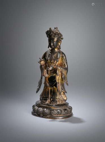 A Chinese gilt-lacquered figure of Buddha
