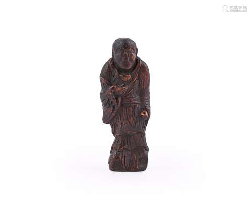 A Chinese carved wood figure of a Buddha