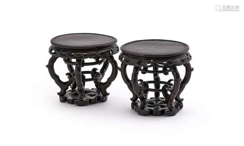 A good pair of Chinese hardwood circular stands