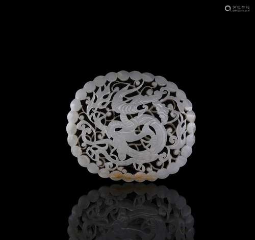 A Chinese pale celadon jade reticulated \'Dragon\' plaque