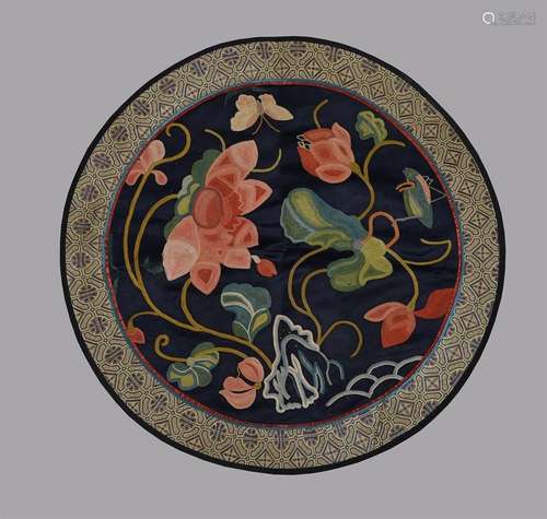 A Chinese embroidered silk roundel