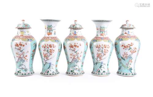 A Chinese garniture of five large Famille Verte vases