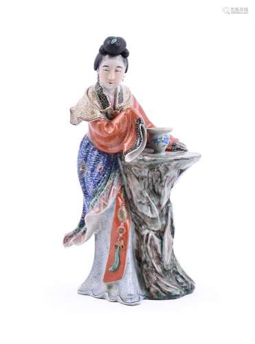 A Chinese Famille Rose figure of a Court Lady