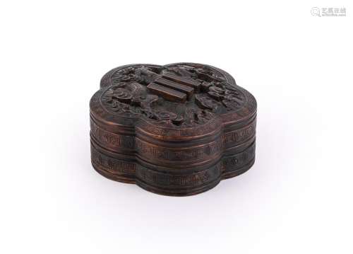 A Chinese lobed hardwood \'Dragon and Trigram\' box and cove...