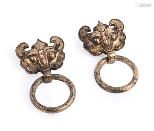A pair of Chinese gilt bronze taotie handles with suspending...
