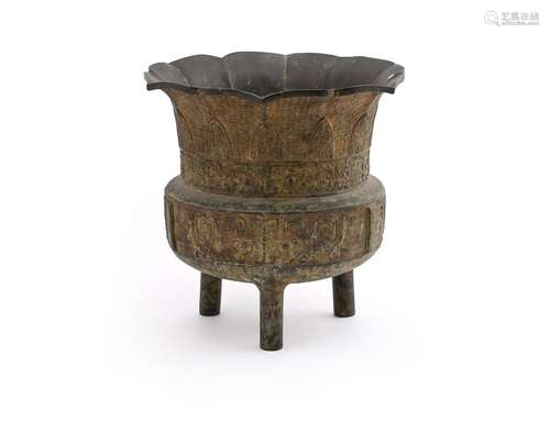 A large Chinese archaistic bronze tripod jardinière