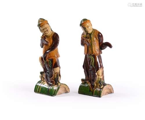 An unusual pair of Sancai-glazed ridge-tile figures of \'dan...