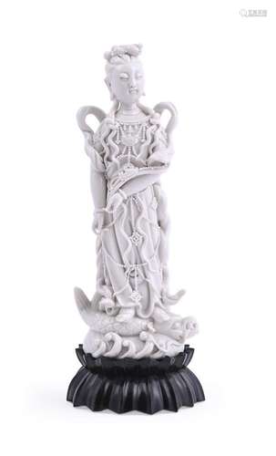 A well modelled Dehua figure of Guanyin