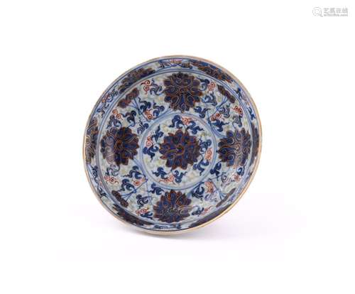 A small Chinese blue and gilt \'Lotus\' saucer