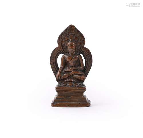 A small bronze seated figure of Buddha