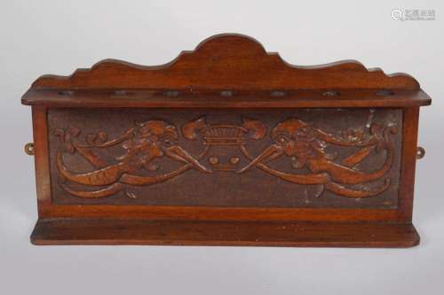 EDWARDIAN CARVED WALNUT PIPE STAND