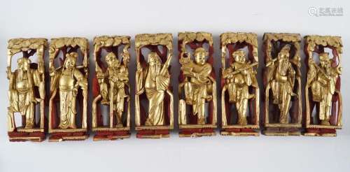 SET OF 8 CHINESE CARVED GILTWOOD LOHAN FIGURES