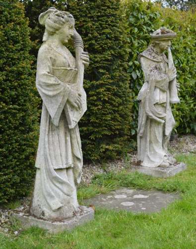 PAIR OF MOULDED STONE FIGURES