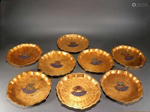 A set of old Tibetan gilt-burned blue eight-treasure plate