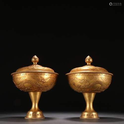 A Pair of Old Tibetan Gilt Bronze Vessels with Dragon Patter...