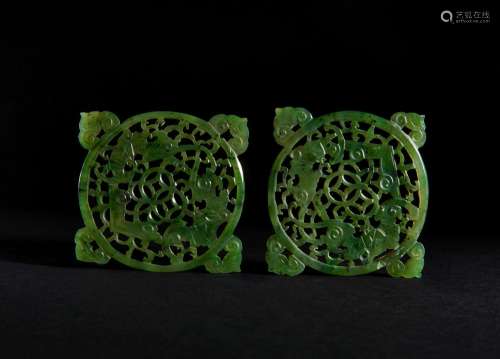 A PAIR OF CHINESE RETICULATED SPINACH JADE DISCS QING DYNAST...