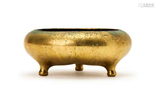 A CHINESE GILT BRONZE TRIPOD CENSER, 18TH CENTURY OR EARLIER...