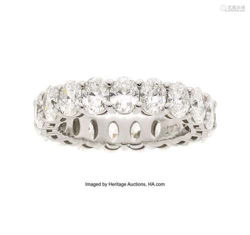 Diamond, Platinum Eternity Band Stones: Oval-shaped diamonds...