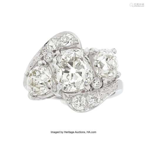 Diamond, Platinum Ring Stones: Cushion-shaped diamonds weigh...