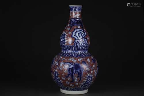 Blue and white underglaze red animal pattern gourd bottle