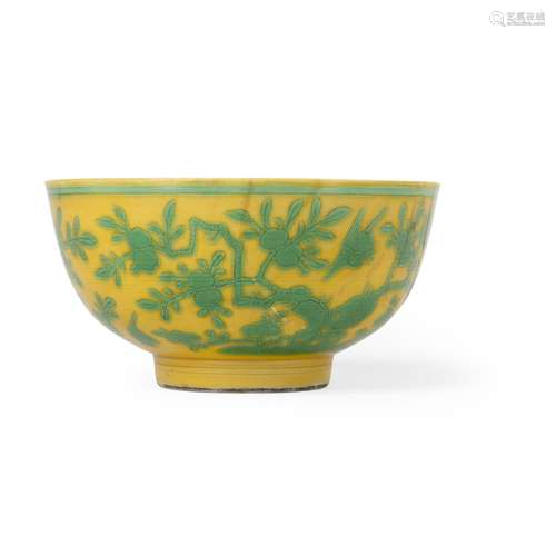 YELLOW-GROUND GREEN-ENAMELLED 'PEACH TREES' BOWL QING DYNAST...