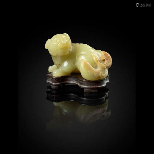 YELLOW JADE WITH RUSSET SKIN CARVING OF A LION DOG QING DYNA...