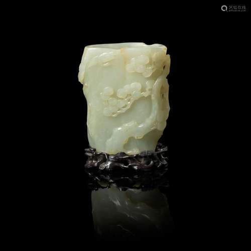 PALE CELADON JADE 'PINE TREE AND CRANE' BRUSH POT QING DYNAS...