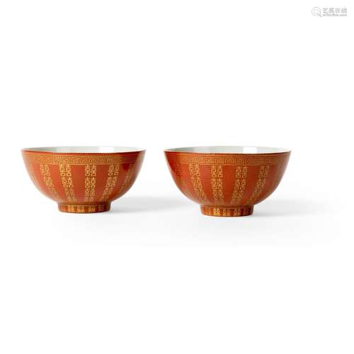 TWO CORAL-RED-GROUND GILT-DECORATED 'DOUBLE HAPPINESS' BOWLS...